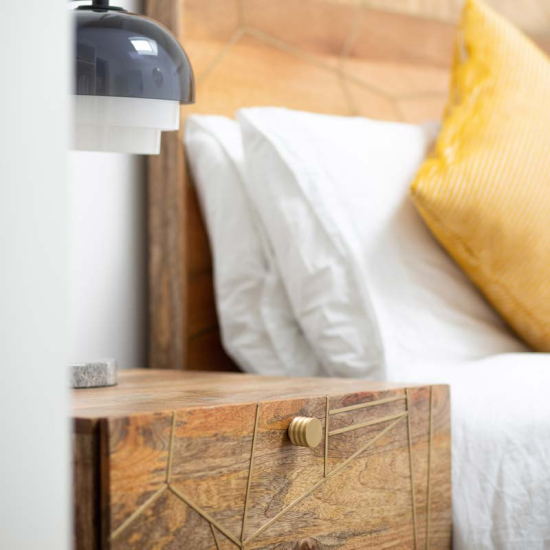 Hoxton Sturt cupboard knob on a bedside table